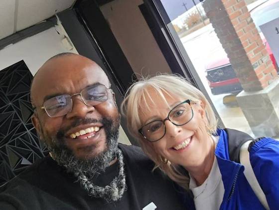 Owner with a customer
