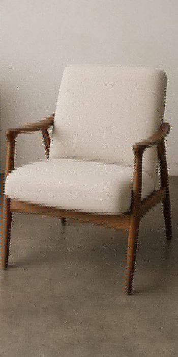 Reupholstered armchair after